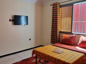 Μια τηλεόραση ή/και κέντρο ψυχαγωγίας στο Tilila Holiday Apartments, Agadir