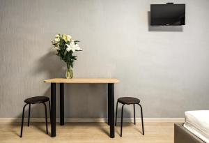 TV a/nebo společenská místnost v ubytování River House Apartments