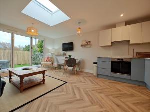 a kitchen and living room with a table in it at 3 Bed in Shanklin oc-w33402 in Shanklin