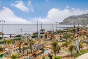 a view of a water park next to the ocean at 3 Bed in Shanklin oc-w33402 in Shanklin