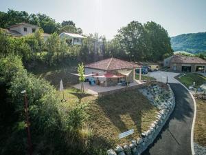 an overhead view of a house with a yard at Les Raspes du Samphy in Saint-Victor-et-Melvieu +21 photos