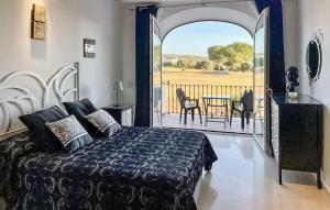 Ένα ή περισσότερα κρεβάτια σε δωμάτιο στο 2 Bedroom Nice Home In Arcos De La Frontera