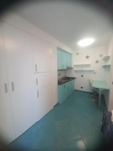 Η κουζίνα ή μικρή κουζίνα στο Stella Marina