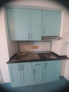 Η κουζίνα ή μικρή κουζίνα στο Stella Marina +5 φωτογραφίες