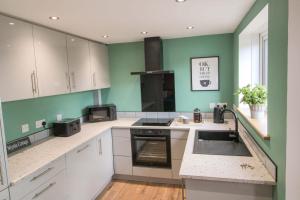 Köök või kööginurk majutusasutuses Myrtle Cottage, Cotehill, near Carlisle