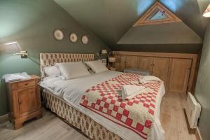 Postel nebo postele na pokoji v ubytování Roche des Fours 210