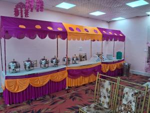 a table set up for a party with a carousel at Kailash Haveli in Bikaner