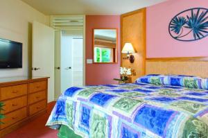 En eller flere senge i et værelse på Bali Hai Resort - 2BR Apartment with Resort Access + 25 billeder