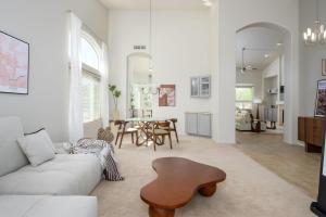 a living room with a couch and a table at Echo Ridge home in Scottsdale