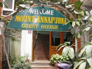 un cartello di benvenuto per una struttura mtimpimpimp di Mount Annapurna Guest House a Kathmandu