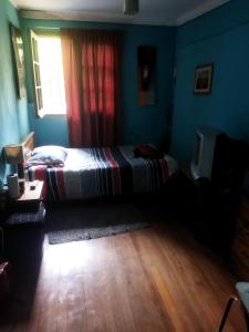 Ένα ή περισσότερα κρεβάτια σε δωμάτιο στο El Bosque