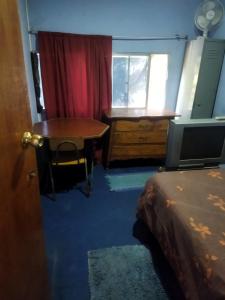 Ένα ή περισσότερα κρεβάτια σε δωμάτιο στο El Bosque