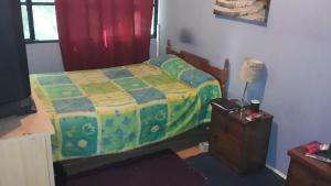 Ένα ή περισσότερα κρεβάτια σε δωμάτιο στο El Bosque