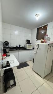 Kuchyň nebo kuchyňský kout v ubytování Nosso Cantinho