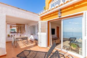 a balcony with a view of the ocean at Vistamar 96 in Benitachell