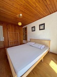 Ένα ή περισσότερα κρεβάτια σε δωμάτιο στο Melisa Garden +26 φωτογραφίες