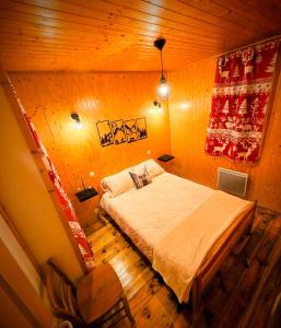 Postel nebo postele na pokoji v ubytování Chalet Entier Proche Ski et Lac