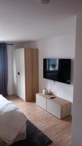 Ένα ή περισσότερα κρεβάτια σε δωμάτιο στο Apartment - Wohnung Bad Pyrmont