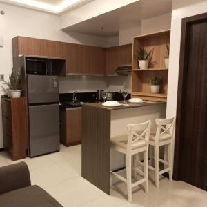 Η κουζίνα ή μικρή κουζίνα στο Suite City view