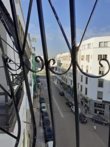 a view of a city street from a window at Chambre au centre de Rabat in Rabat +9 photos