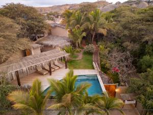 an aerial view of a resort with a swimming pool at Hospedaje La Quebrada in Máncora