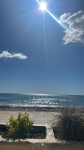 a view of the ocean from the beach at Nasay Magic World in El Borseral