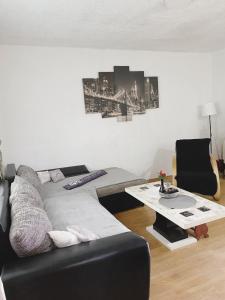 a living room with a couch and a table at Kuća za odmor ,,BREZA,, 