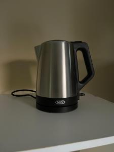 a kettle sitting on top of a counter at Travelers Home in Richards Bay