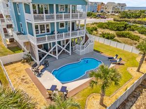 an aerial view of a house with a swimming pool at Sunny Second Row Beach and BIG views in Varnamtown