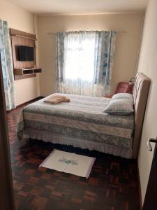 Кровать или кровати в номере Grünes Haus 2 quartos no centro +19 фотографий