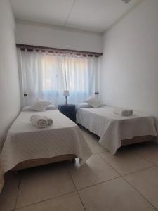 Ένα ή περισσότερα κρεβάτια σε δωμάτιο στο Apolo Hotel +38 φωτογραφίες