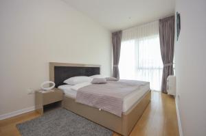Postel nebo postele na pokoji v ubytování Hotel Tre Canne