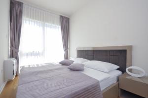 Postel nebo postele na pokoji v ubytování Hotel Tre Canne