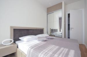 Postel nebo postele na pokoji v ubytování Hotel Tre Canne