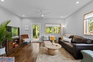 a living room with a couch and a table at On Cloud Durham Unit B in Durham