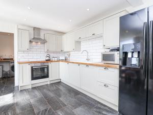 Kuchyň nebo kuchyňský kout v ubytování Tapps Lodge