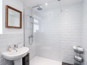 Koupelna v ubytování Tapps Lodge + 23 fotografií