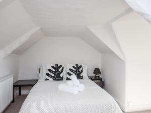 Postel nebo postele na pokoji v ubytování Tapps Lodge