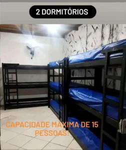 En eller flere senge i et værelse på Casa praia 2