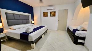 Ένα ή περισσότερα κρεβάτια σε δωμάτιο στο Naturally bright stay for 4 plus shared pool +14 φωτογραφίες