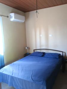 Katil atau katil-katil dalam bilik di Punta barco apartments +15 gambar