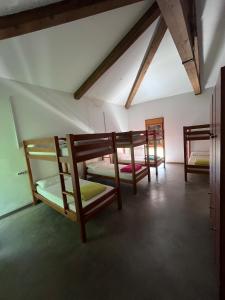 a group of bunk beds in a room at Alojamiento Rural La Arboleda in Noviercas