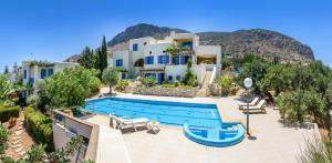 an image of a villa with a swimming pool at Eleni Villas in Hersonissos