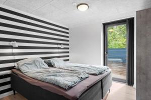 Ένα ή περισσότερα κρεβάτια σε δωμάτιο στο HA387-Hals-Thomas-Winters-Vej-40