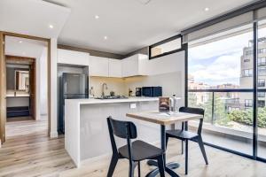 Η κουζίνα ή μικρή κουζίνα στο Wynwood House 109