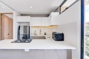 Η κουζίνα ή μικρή κουζίνα στο Wynwood House 109