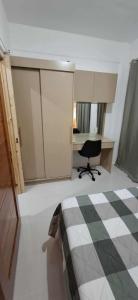 Una cama o camas en una habitación de Royal Ocean Crest- Mactan