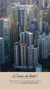 a view of a large city with buildings at American - Casa Hotel in La Paz