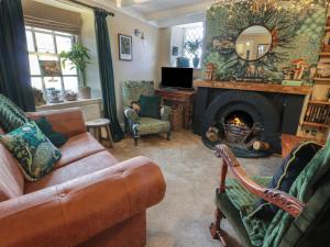 Posezení v ubytování Rowantree Cottage