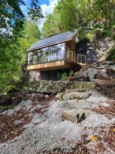 a house on the side of a mountain at Backyard Camps in Bjerkreim